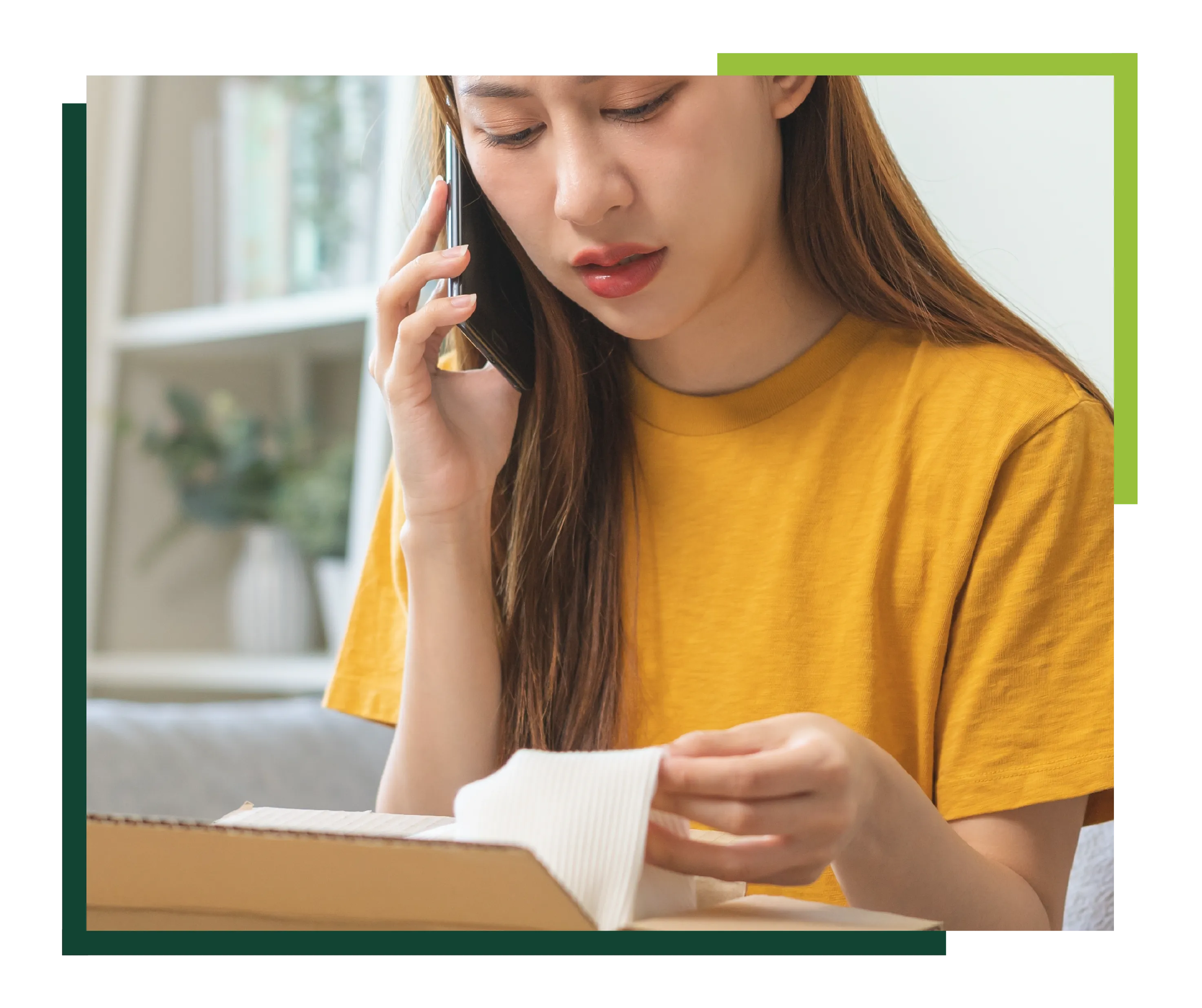 A woman on the phone calling to return a purchased item.